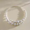 Gargantilha Aberta Choker Redonda de Vidro Pérola Falsa Bloqueio de Cor Cruzado Europeu e Americano Colar de Personalidade da Moda Acessório de Pescoço de Nicho de Alta Qualidade