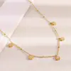 Europa y Estados Unidos tendencia de moda transfronteriza retro exquisita joyería acero inoxidable chapado en oro de 18 quilates circón flor clip cadena de cuentas mujer