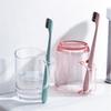 Taza para lavar creativa para el hogar de plástico taza para cepillarse los dientes al por mayor de fábrica taza para cepillos de dientes para pareja con asa taza para enjuague bucal para estudiantes