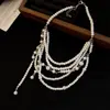 Collar de perlas de múltiples capas vintage francés, estilo de lujo ligero y de alta gama, cadena elegante para la clavícula, nuevo accesorio para mujer 2026