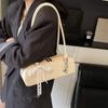 Bolso Nicho de Textura de Alta Gama Estilo Francés Lazo Moderno Pañuelo de Seda Combinable Bolso Sobaco Simple Estilo Occidental Bolso de Hombro Baguette Francés