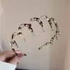 Pinza para el pelo versátil 2026 para salir, lavarse la cara, diadema de moda, diadema de alta calavera de nueva ola, cueva para el pelo de mujer