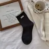 Novedad de otoño, calcetines de doble puño a bloques de color para mujer, calcetines de algodón hasta la pantorrilla con borde enrollado, calcetines holgados versátiles de tela con etiqueta estilo japonés sin costuras