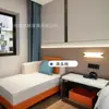 Mobiliario de Hotel Yizhi Diseño Moderno Minimalista Hotel B&B Habitación Estándar Habitación Individual Habitación con Cama Grande Habitación de Huéspedes Diseño de Habitación Renovación