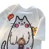 Camiseta de cuello redondo y manga corta con estampado de personaje de gato de dibujos animados de seda de leche para parejas, top casual suelto de verano