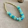 Conjunto de joias de colar e brincos de flor com contas ovais em acrílico, acessórios de estilo de férias doces e dopamina de verão