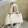 Bolso de mano de alta gama transfronterizo para mujer, nuevo bolso tote retro de moda para el día a día, bolso de hombro y cruzado de gran capacidad, moderno
