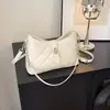 Bolsa de Braço Estilo Novo de Verão, Moderna e Versátil para o Dia a Dia, Bolsa de Ombro Texturizada, Bolsa Feminina com Fivela de Fechamento, Bolsa Transversal Simples