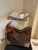 Bolso Cubo al por Mayor Estilo Nuevo 2025 Moderno Sencillo de Gama Alta Estilo Extranjero Gran Capacidad Bolso Versátil para Mujer Bolso de Mano con Estampado de Leopardo