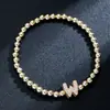 Pulsera elástica para mujer Amazon Transfronteriza Moda Letra Simple Cobre Incrustado con Circonita y Cuentas Uvccb