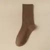 Calcetines para mujer primavera y otoño Cuatro Estaciones calcetines de media pantorrilla color liso desodorantes absorbentes de sudor estilo ins japonés calcetines de rizo para confinamiento venta al por mayor