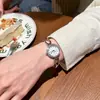 GEDI GEDI nuevo reloj de cuarzo simple casual elegante marco de reloj con pedrería moda diseño de nicho reloj de pulsera para mujer