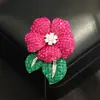 Broche de cristal azul y rojo con forma de rosa de alta gama, lujo europeo y americano, elegante, único y estiloso para mujer