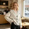 Suéter de punto de moda europeo y americano talla grande para mujer, nuevo estilo otoño/invierno, diseño versátil de bloques de color blanco y negro, corte holgado y relajado, cárdigan de punto