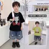 Conjunto de Manga Corta para Niños 2026 Nuevo Atuendo de Verano Estilo Coreano Camiseta de Dibujos Animados Pantalones Cortos de Mezclilla Bebé Delgado Conjunto de Dos Piezas Moderno