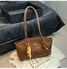 Bolsa de Ombro Grande Capacidade Feminina 2025 Nova Tendência Outono e Inverno Moda Retrô Bolsa Tote de Trabalho para o Dia a Dia Bolsa de Mão