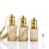 Garrafas de óleo essencial de vidro para atacado, frascos com aplicador roll-on galvanizados, frascos dosadores cosméticos, espátulas de vidro, amostras de spray de perfume com esfera de aço