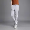 Lote direto da fábrica de calças casuais para todas as estações cintura com três listras calças esportivas Leggings justas curinga feminino uma geração de cabelo