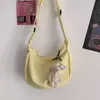 Bolso de hombro y bandolera versátil simple diario para mujer, estilo coreano, nuevo color caramelo, patrón de gofres, artístico, transfronterizo, para estudiante