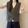 Elegante y chic chaleco de punto asimétrico con cuello en V para mujer, una nueva pieza casual de otoño/invierno que se puede combinar fácilmente con suéteres y otras prendas superiores.