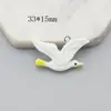 Accesorios DIY serie estilo océano resina cangrejo pantuflas delfín hueso de pez ancla botella a la deriva colgante