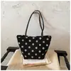 Bolso de gamuza vintage de nicho para mujer para otoño e invierno, nuevo bolso de hombro casual para el día a día 2026, bolso de mano tipo cubo