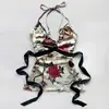Top sin mangas estilo europeo y americano con cuello halter y estampado picante, cintura con amarre, espalda descubierta, escote pronunciado, top corto estilo vacacional vintage
