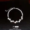 Pulseira redonda geométrica transfronteiriça com zircônia, toque de luxo leve de nicho de alta qualidade, simples e elegante, acessório de mão versátil