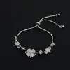 Pulsera de Flor de Trébol de Cuatro Hojas Nueva con Incrustaciones de Diamantes Estilo Coreano Super Hada Temperamento Sensación de Alta Gama Lujo Ligero Moda Versátil Accesorios de Pulsera Venta al Por Mayor