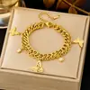 Pulsera de joyería de moda dorada ins para combinar con todo, pulsera de acero de titanio simple de lujo ligero, trébol de cuatro hojas para mujer, transfronteriza