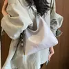Nova bolsa de outono feminina para o trabalho, moda coreana, de mão, de ombro, sob o braço, grande capacidade, transversal, 2026, sensação de luxo leve