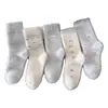 Calcetines de lana australiana para mujer estilo coreano azul lechoso con lazo calcetines de media pantorrilla koala lindo de dibujos animados engrosados cálidos calcetines para dormir
