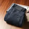 Estación Europea Otoño e Invierno Grueso Suave Rígido Yassel Sarga Elástica Algodón Casual Recto Ajuste Delgado Jeans para Hombre