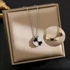 Novo estilo multi-uso coração a coração abre e fecha flor de quatro folhas colar moda feminina amor dobrável titânio aço clavícula corrente joia