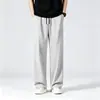 Pantalones rectos de seda helada de alta calidad, holgados y finos, estilo coreano, de fábrica de comercio exterior, para hombre, casual, de secado rápido para exteriores, con sensación fresca