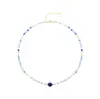 El nuevo modelo más vendido de TK presenta un diseño único con piedras naturales de colores, ofreciendo una sensación de alta gama y un sencillo collar en capas con perlas azules naturales.