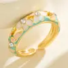 Anillo Abierto Sencillo con Flores Pequeñas de Goteo de Aceite Incrustadas de Diamantes Estilo Ins Transfronterizo Europeo y Americano Joyería de Mano Anillo de Cola Dulce Personalizado Anillo