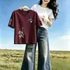 Camiseta de Manga Corta de Alta Gama para Mujer con Cuello en V y Estampado, Nuevo Estilo de Verano Top que Cubre la Barriga 2026 Moda Suelto que Cubre el Cuerpo