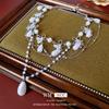 Collar de perlas con forma de mariposa estilo retro francés, elegante y moderno, con cadena de clavícula, versátil y de alta gama.