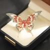 Sun Cloud Novo Produto Personalidade Gotejamento de Cola Broche Borboleta Vermelho e Azul Temperamento Banhado a Ouro Gotejamento de Cola Pin Inseto Exagerado