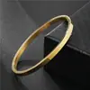 Pulseira Masculina Simples para Casal de Aço Titânio Quente Banhada a Ouro 18K Europeia e Americana Aço Inoxidável Antidesbotamento Joias da Moda
