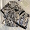 Estampado de pintura china con tinta nuevo transfronterizo manga corta pantalones cortos para mujer viento de temperamento de verano ropa de casa se puede usar afuera toma real al por mayor