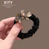 Novo Elástico de Cabelo Borboleta com Strass Cor Champagne, Corda de Cabelo Versátil de Alta Elasticidade para Rabo de Cavalo e Coque, Acessório de Cabelo Moderno para Mulheres