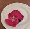 Usando flor lazo orquídea flor clip lateral femenino sentido de atmósfera fotografía película clip para flequillo adorno para la cabeza de vacaciones junto al mar