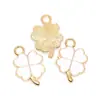 Colgante de trébol de cuatro hojas de la suerte multicolor de venta caliente transfronteriza con goteo de aceite Accesorios de joyería de aleación DIY Colgante de collar y pulsera