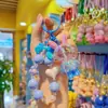 Novos Fones de Ouvido Coloridos com Contas Pingente de Bolsa de Coelho Espacial Chaveiro de Coelho Carto Enfeites de Estudante
