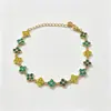 Pulseras de flor de acero de titanio con incrustaciones de diamantes, las más vendidas en Europa y América, accesorios de lujo ligero de nicho, cadenas para la clavícula, pulseras de trébol de cuatro hojas, venta al por mayor desde el fabricante