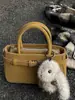 Bolsa de Mão Estilo Western Retrô de Nicho Novo Estilo Inverno 2025 Bolsa Transversal Personalizada Bolsa de Ombro Fashion Simples Tendência