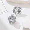 Pendientes de flores verticales con diseño de personalidad de estilo coreano, elegantes pendientes de acero de titanio a la moda para mujer, no se decoloran, venta al por mayor, combinables con todo.