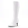 Novas botas femininas europeias e americanas outono/inverno: botas de montaria simples de couro envernizado de cano alto, botas de salto alto, tamanhos 40-47, botas plus size para exportação